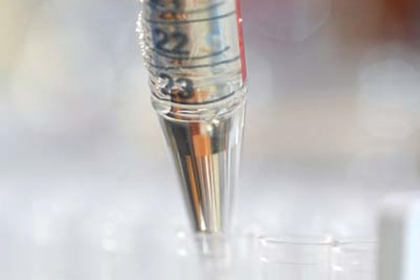 close-up of metal pipette