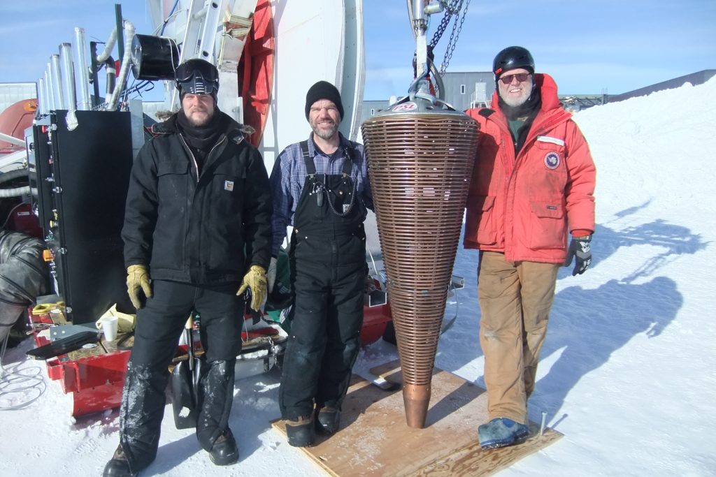 Terry Benson Benson with Jeff Cherwinka and Darrell Hamilton, all PSL staff, at the South Pole with PSL equipment.