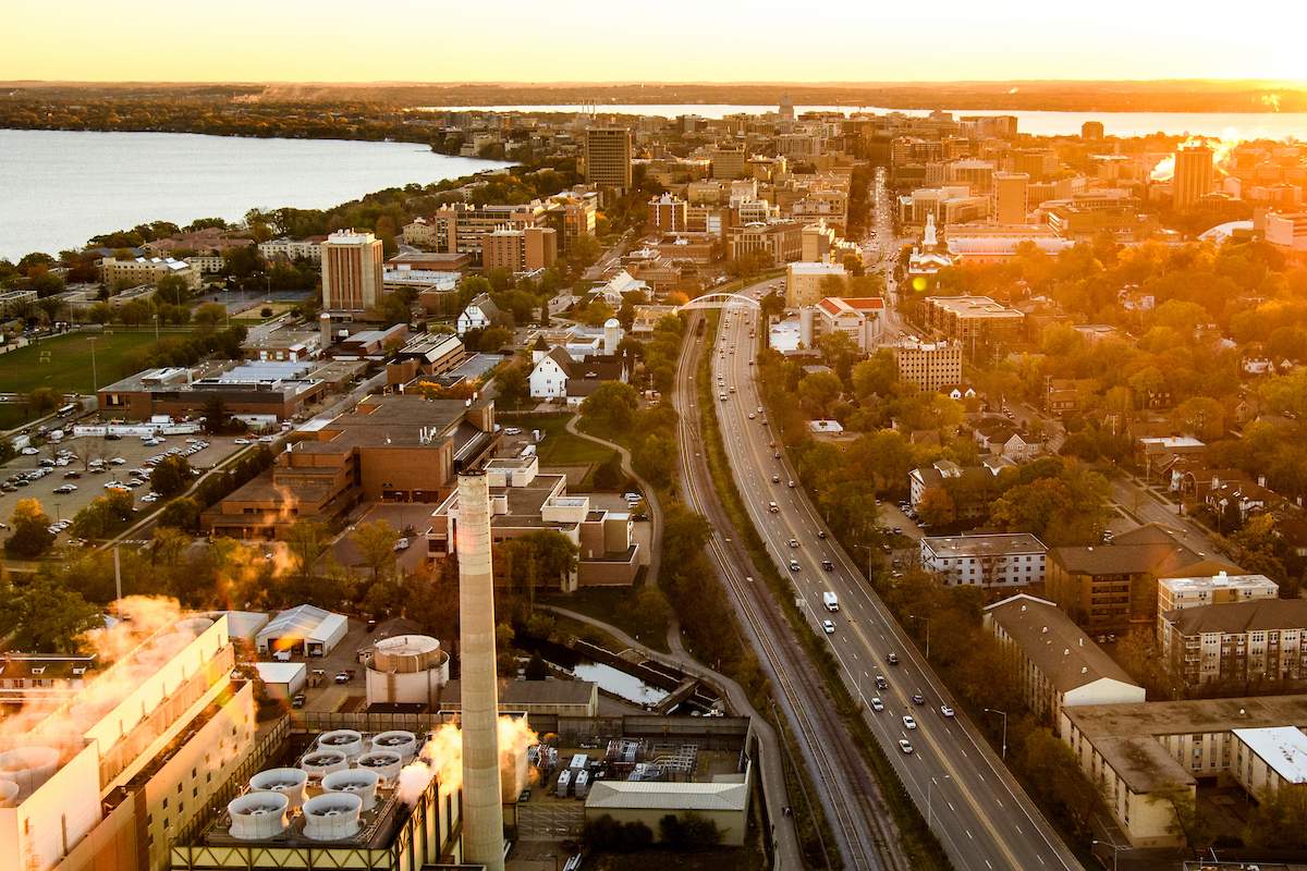 The UW-Madison campus and Lake Mendota are pictured looking eastward in an early morning aerial taken from a helicopter on Oct. 23, 2018. (Photo by Bryce Richter /UW-Madison)